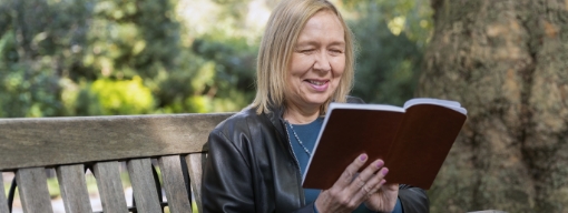 Woman reading on a bench